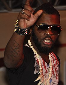 220px-Arafat_Dj_en_prestation_4_(cropped)